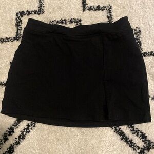 XS urban outfitters mini black skirt with built in shorts underneath
